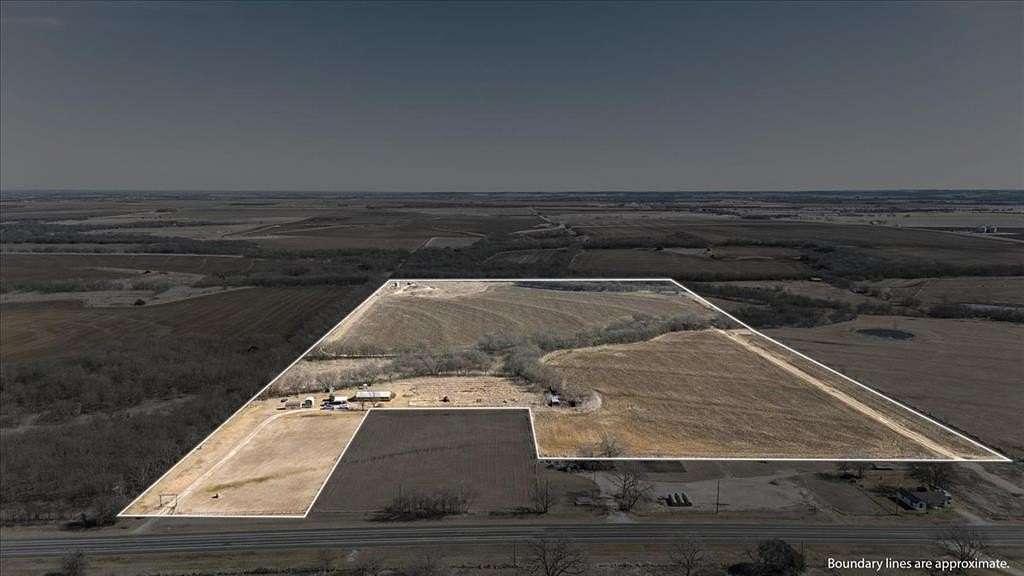 54 Acres of Land with Home for Sale in Covington, Texas