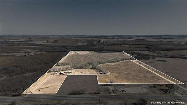 54 Acres of Land with Home for Sale in Covington, Texas