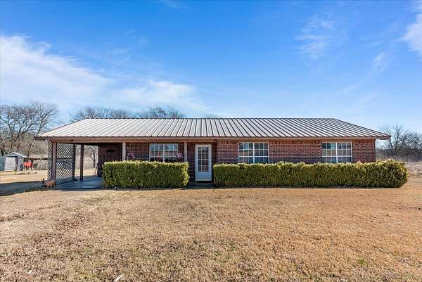 54 Acres of Land with Home for Sale in Covington, Texas