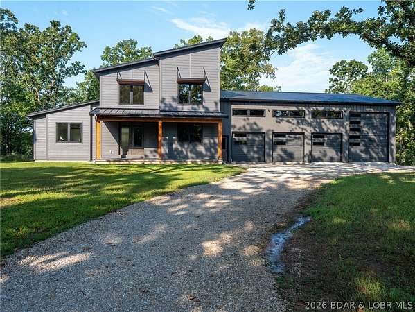 5 Acres of Land with Home for Sale in Linn Creek, Missouri