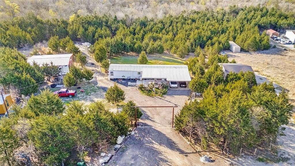 10 Acres of Recreational Land with Home for Sale in Palmer, Texas