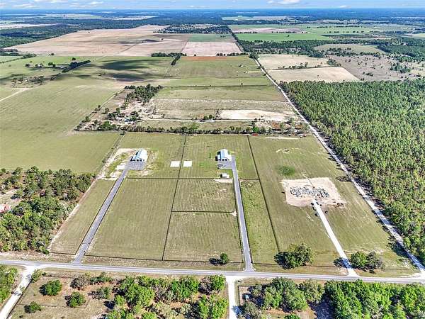 12.5 Acres of Land with Home for Sale in Morriston, Florida