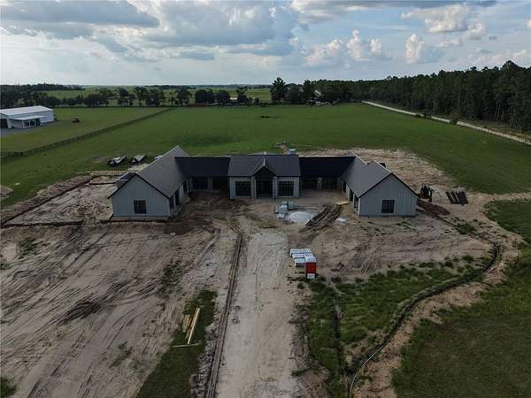 12.5 Acres of Land with Home for Sale in Morriston, Florida