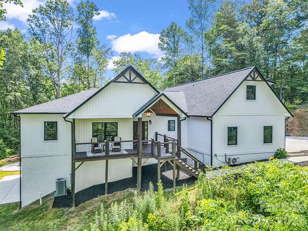 6.54 Acres of Land with Home for Sale in Horse Shoe, North Carolina