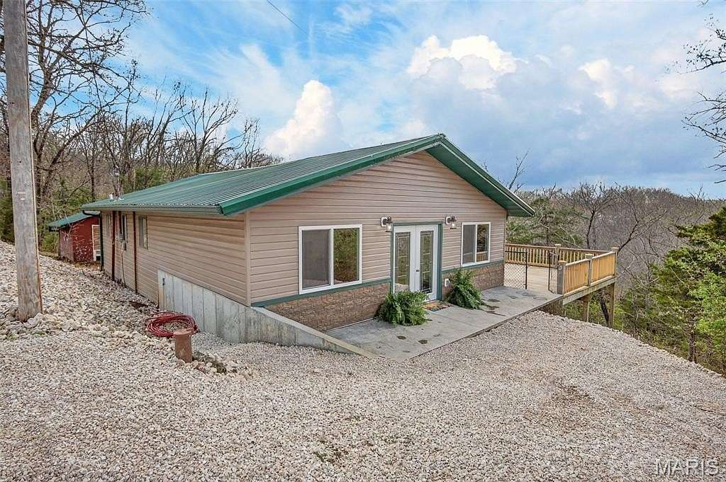 1.9 Acres of Land with Home for Sale in Sunrise Beach, Missouri