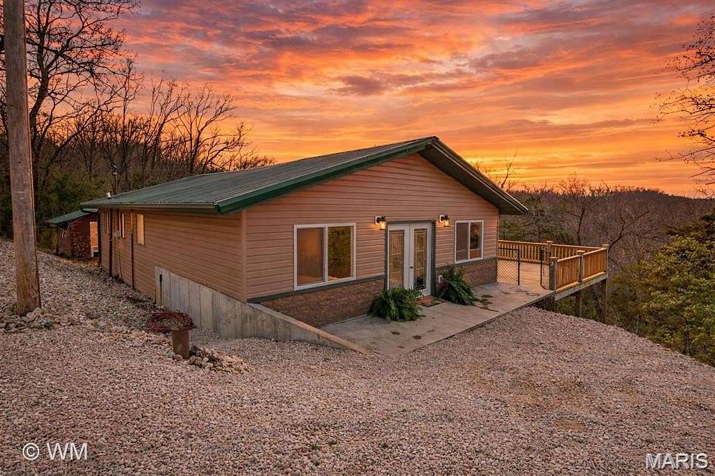 1.9 Acres of Land with Home for Sale in Sunrise Beach, Missouri