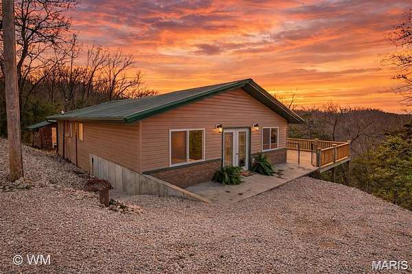 1.9 Acres of Land with Home for Sale in Sunrise Beach, Missouri