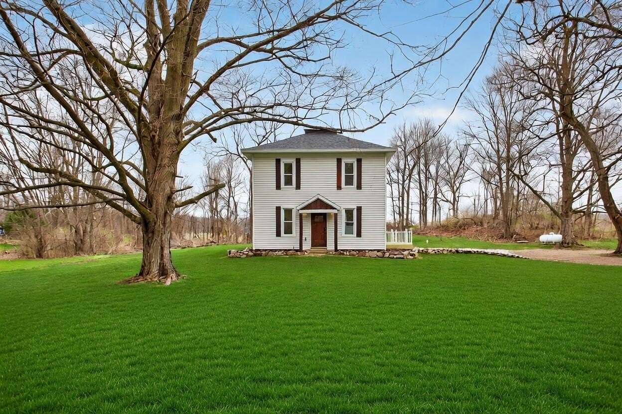 2 Acres of Land with Home for Sale in Horton, Michigan