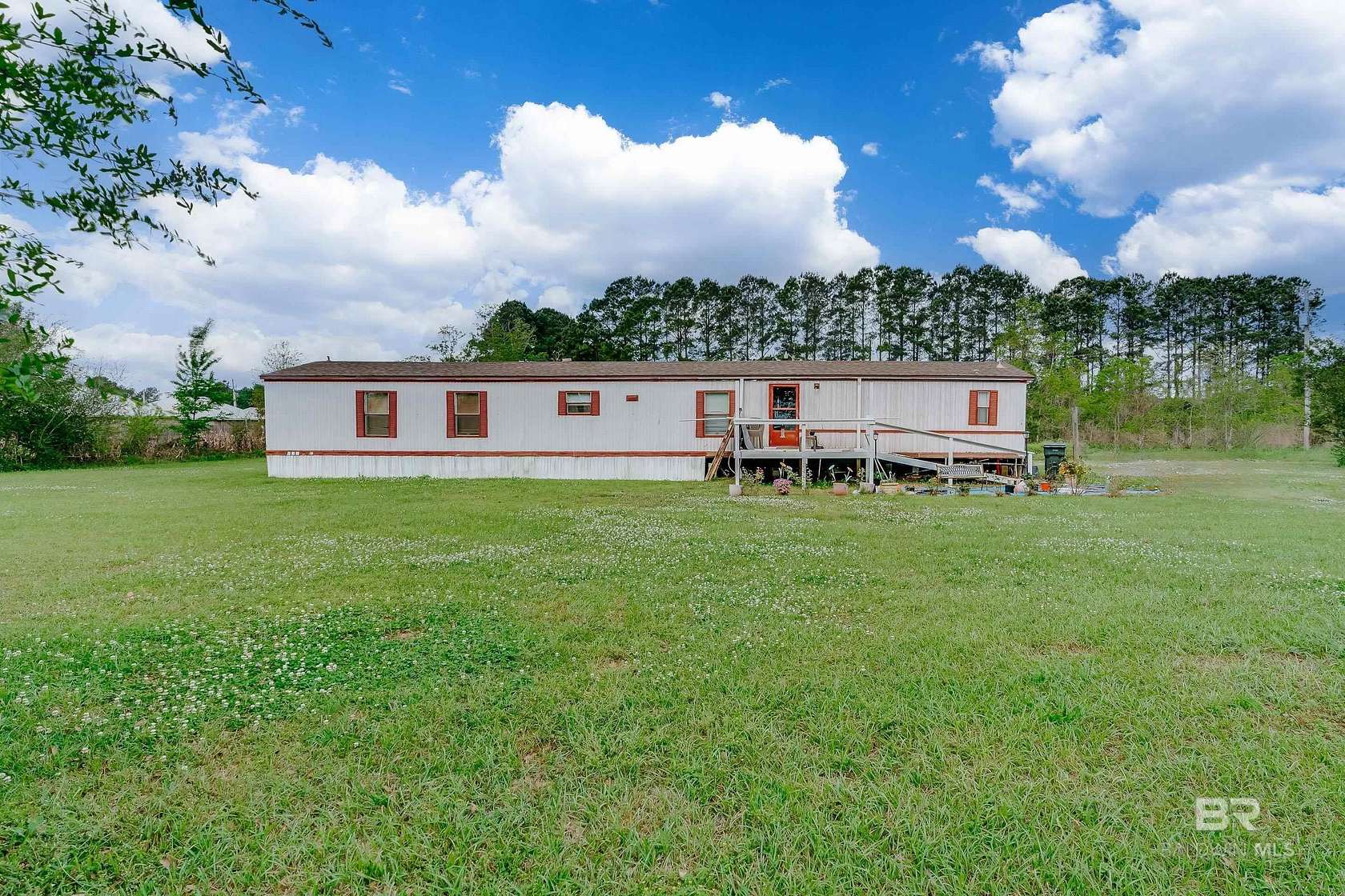 6.26 Acres of Land with Home for Sale in Summerdale, Alabama