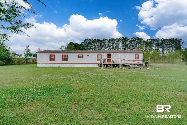 6.26 Acres of Land with Home for Sale in Summerdale, Alabama