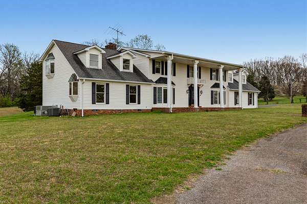 19.5 Acres of Land with Home for Auction in Portland, Tennessee