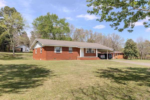 4 Acres of Land with Home for Sale in Perryville, Arkansas