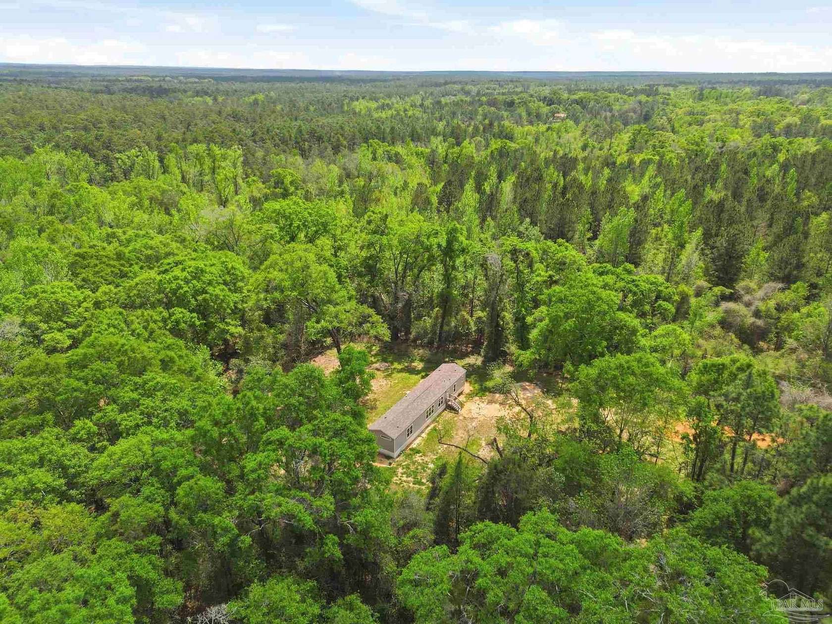 4.46 Acres of Land with Home for Sale in Jay, Florida