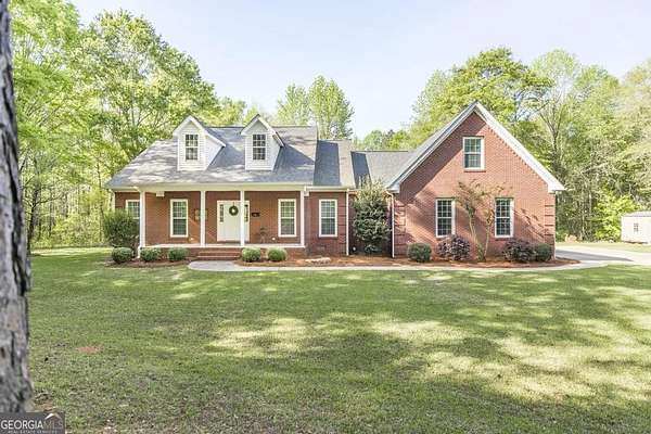12 Acres of Land with Home for Sale in Haddock, Georgia