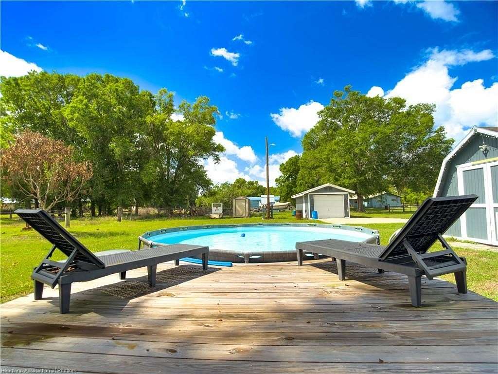 2.46 Acres of Land with Home for Sale in Sebring, Florida