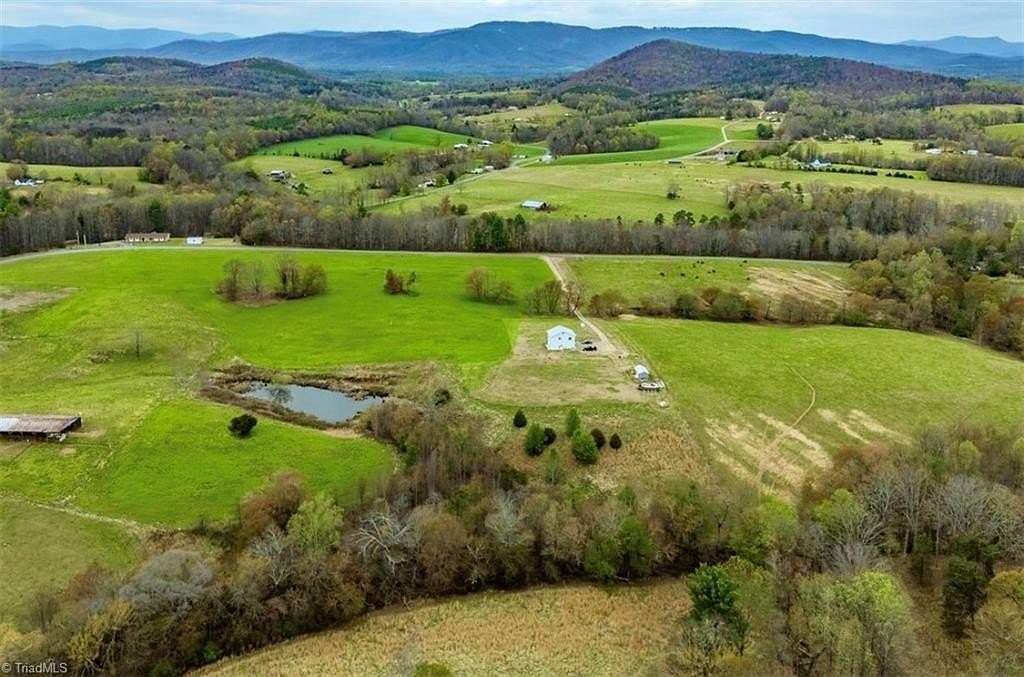 11.2 Acres of Recreational Land with Home for Sale in Elkin, North Carolina