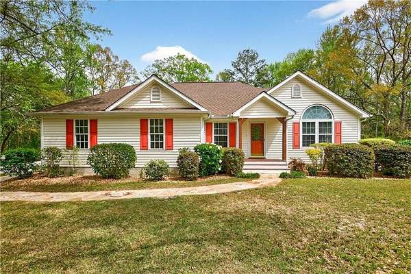 2.78 Acres of Land with Home for Sale in Sharpsburg, Georgia