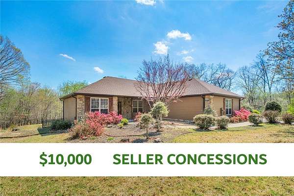 6.77 Acres of Land with Home for Sale in Bella Vista, Arkansas