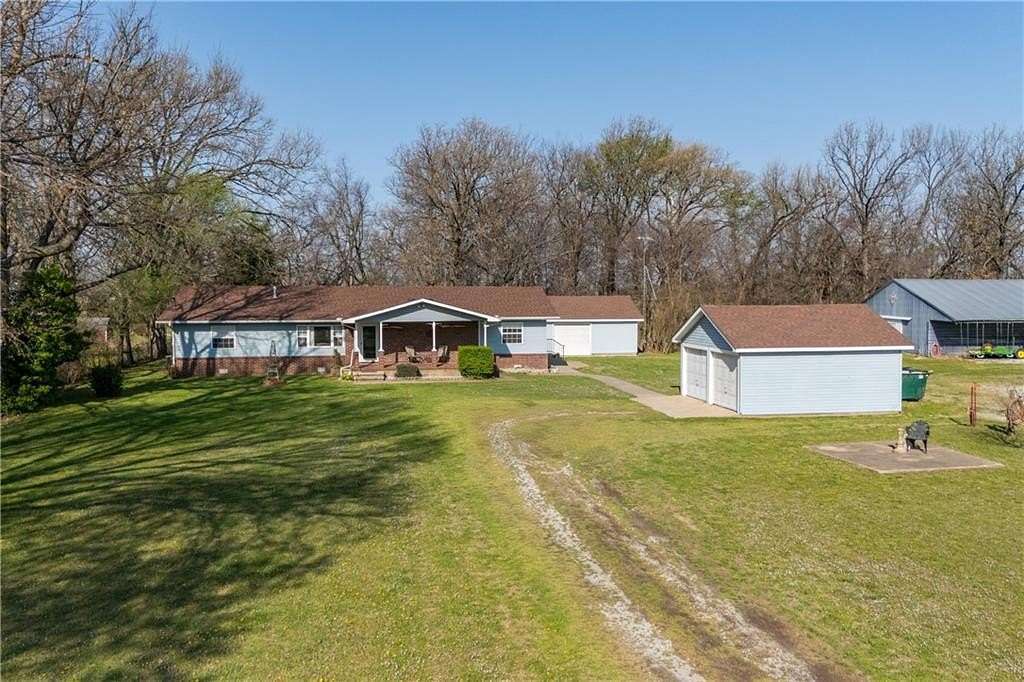 7 Acres of Land with Home for Sale in Siloam Springs, Arkansas