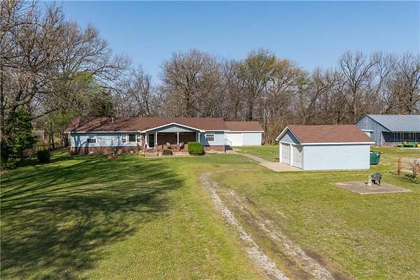 7 Acres of Land with Home for Sale in Siloam Springs, Arkansas