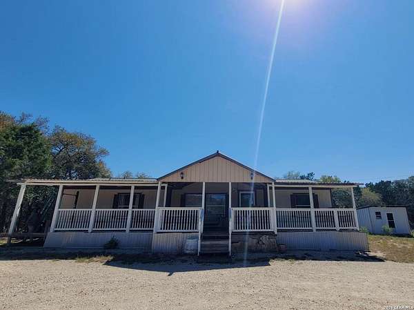 5.1 Acres of Land with Home for Sale in Lakehills, Texas