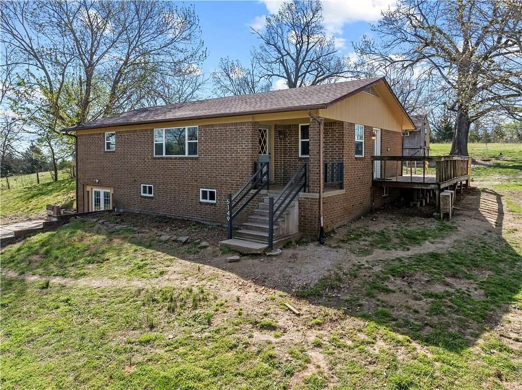 7 Acres of Land with Home for Sale in Harrison, Arkansas