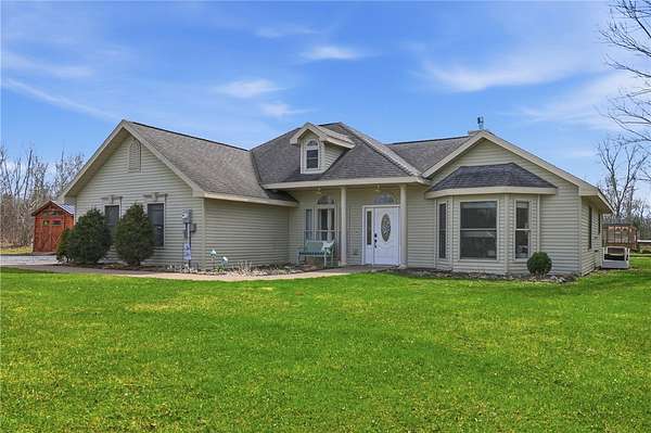 2.62 Acres of Land with Home for Sale in Lansing, New York