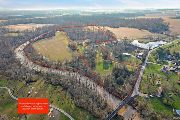 37.6 Acres of Land with Home for Sale in Quincy, Indiana