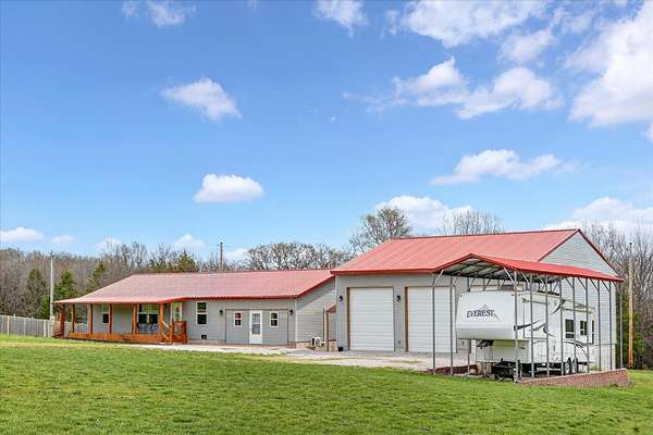 6.58 Acres of Land with Home for Sale in Sparta, Missouri