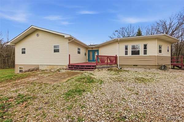 10 Acres of Recreational Land with Home for Sale in Montgomery City, Missouri
