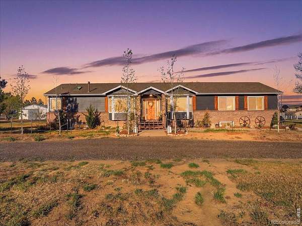 3 Acres of Land with Home for Sale in Loveland, Colorado