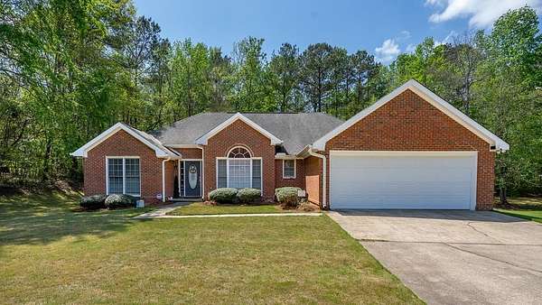 1.63 Acres of Land with Home for Sale in Fortson, Georgia