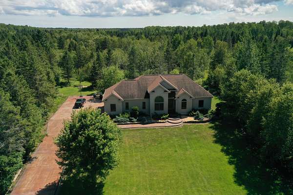 80 Acres of Recreational Land with Home for Sale in Hessel, Michigan