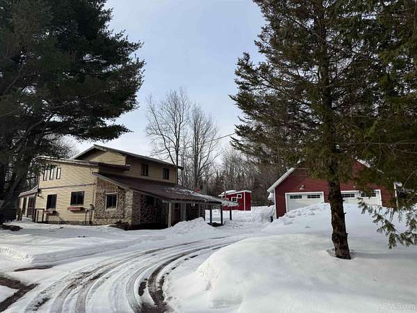 12.3 Acres of Land with Home for Sale in Skandia, Michigan