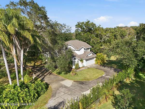 3.12 Acres of Land with Home for Sale in Titusville, Florida