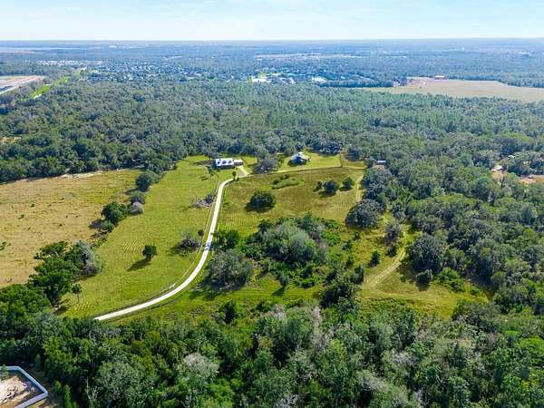 40 Acres of Agricultural Land with Home for Sale in Parrish, Florida