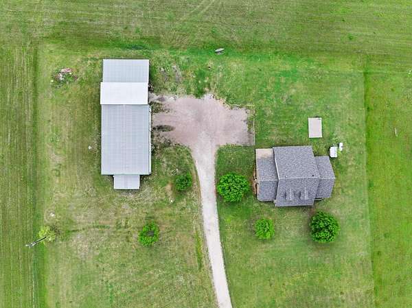 5.61 Acres of Land with Home for Sale in Tioga, Texas