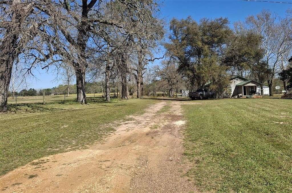 68.8 Acres of Land with Home for Sale in Jacksonville, Texas