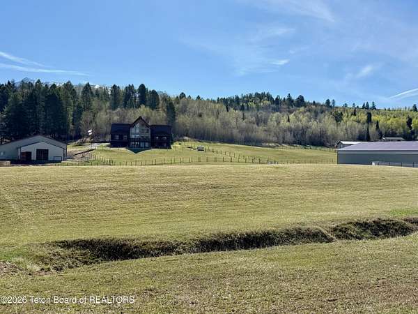 9.7 Acres of Land with Home for Sale in Alpine, Wyoming