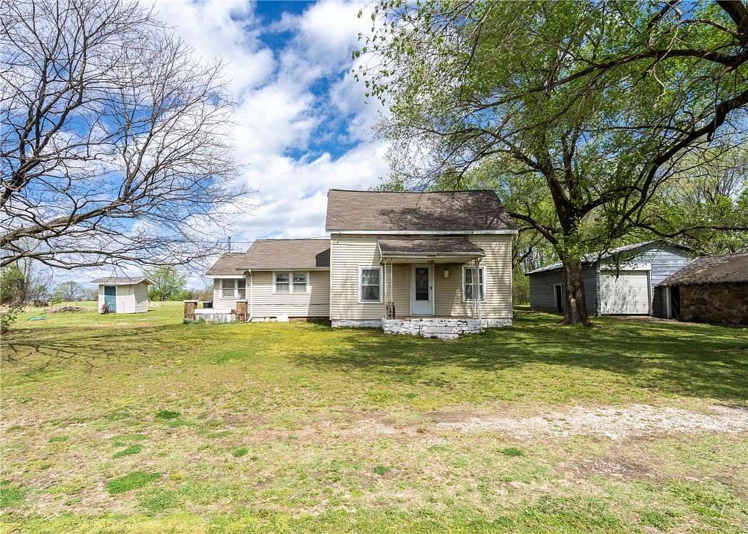 13.1 Acres of Land with Home for Sale in Summers, Arkansas