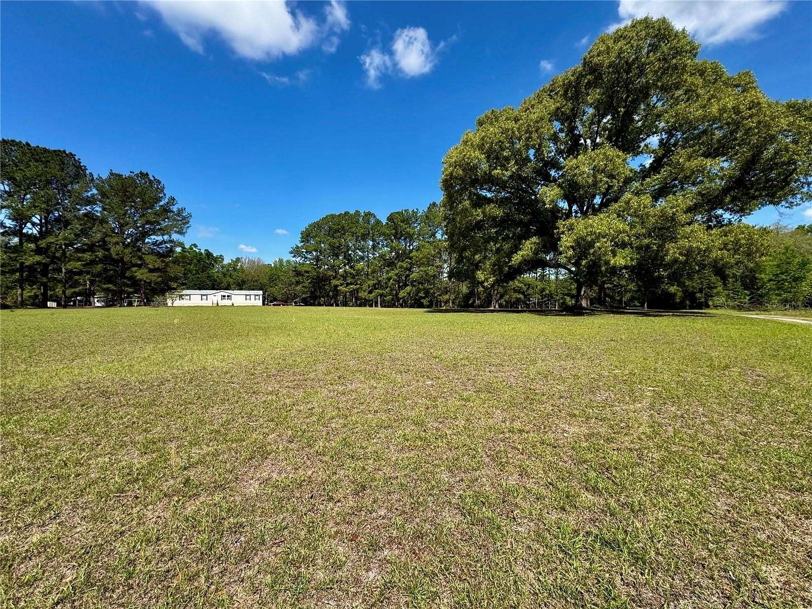 5 Acres of Land with Home for Sale in Alachua, Florida