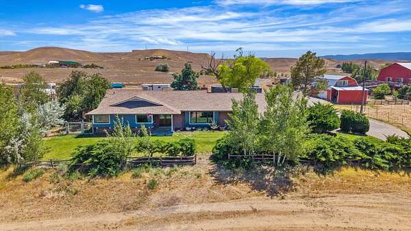 5.6 Acres of Land with Home for Sale in Palisade, Colorado