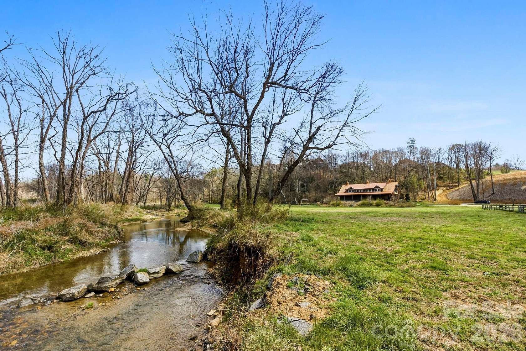 17.7 Acres of Land with Home for Sale in Fletcher, North Carolina