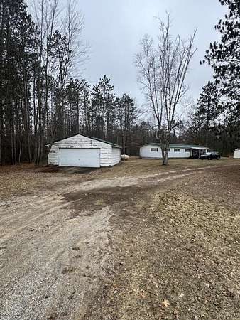 19.1 Acres of Land with Home for Sale in Lake, Michigan