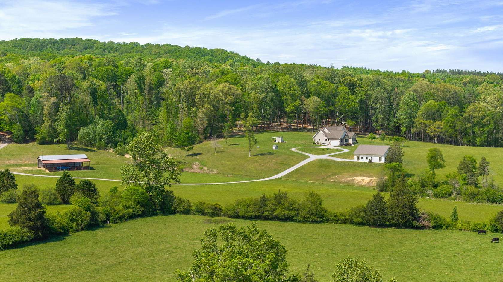 150 Acres of Land with Home for Sale in Riceville, Tennessee