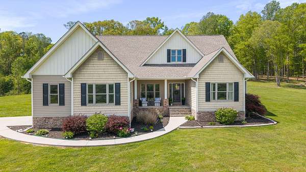 150 Acres of Land with Home for Sale in Riceville, Tennessee