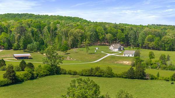 150 Acres of Land with Home for Sale in Riceville, Tennessee