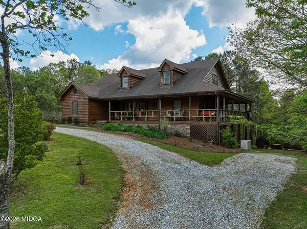 16.6 Acres of Land with Home for Sale in Juliette, Georgia