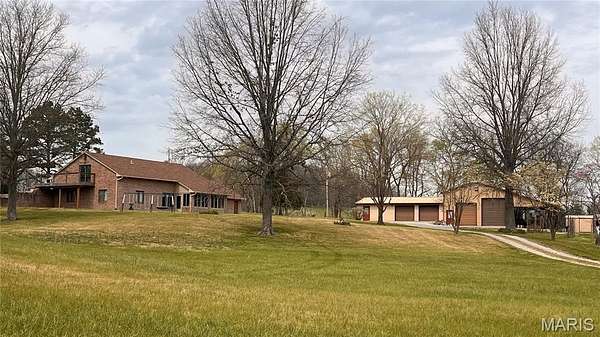 6.38 Acres of Land with Home for Sale in Jackson, Missouri