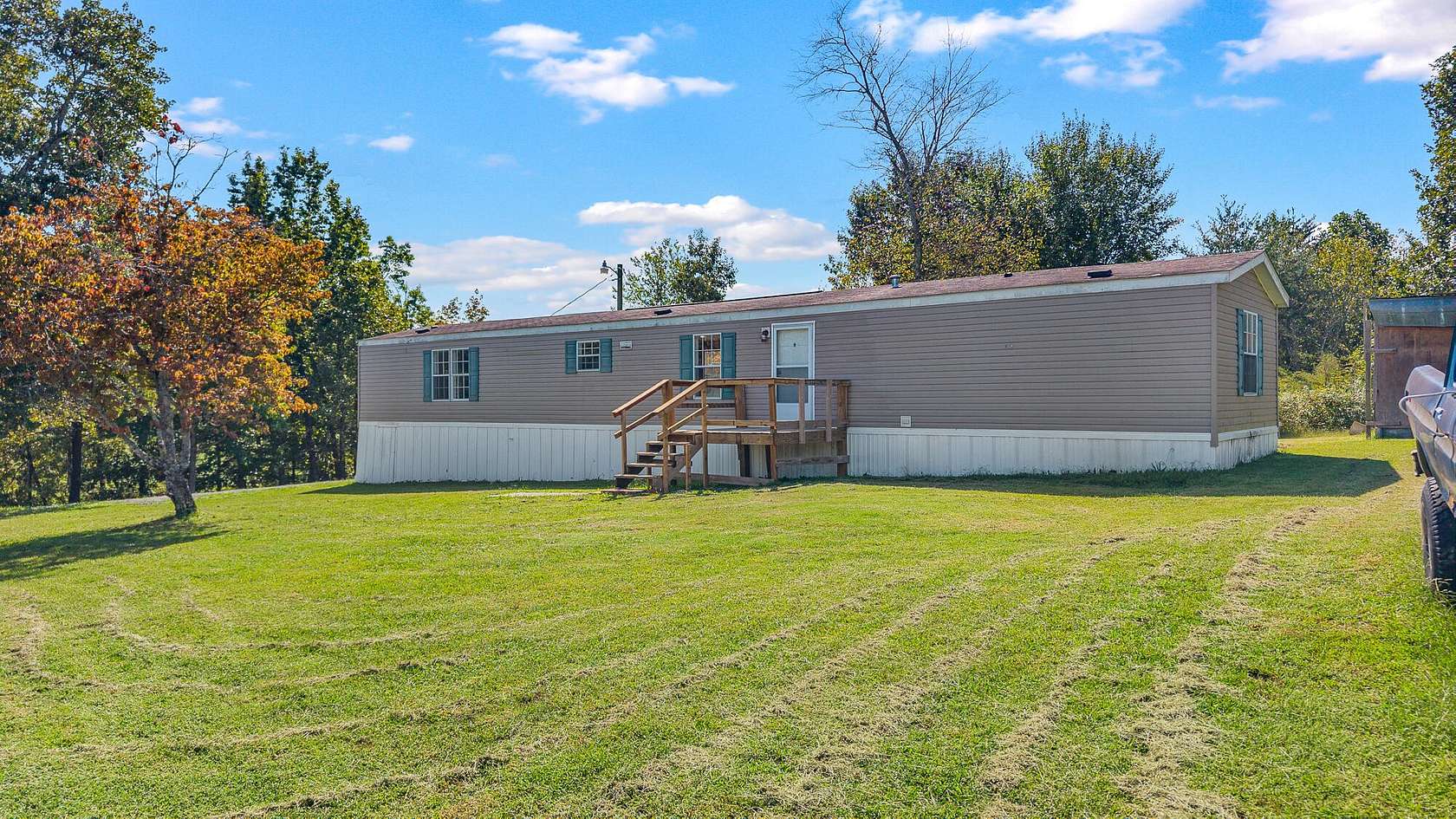 1.5 Acres of Land with Home for Sale in Sweetwater, Tennessee